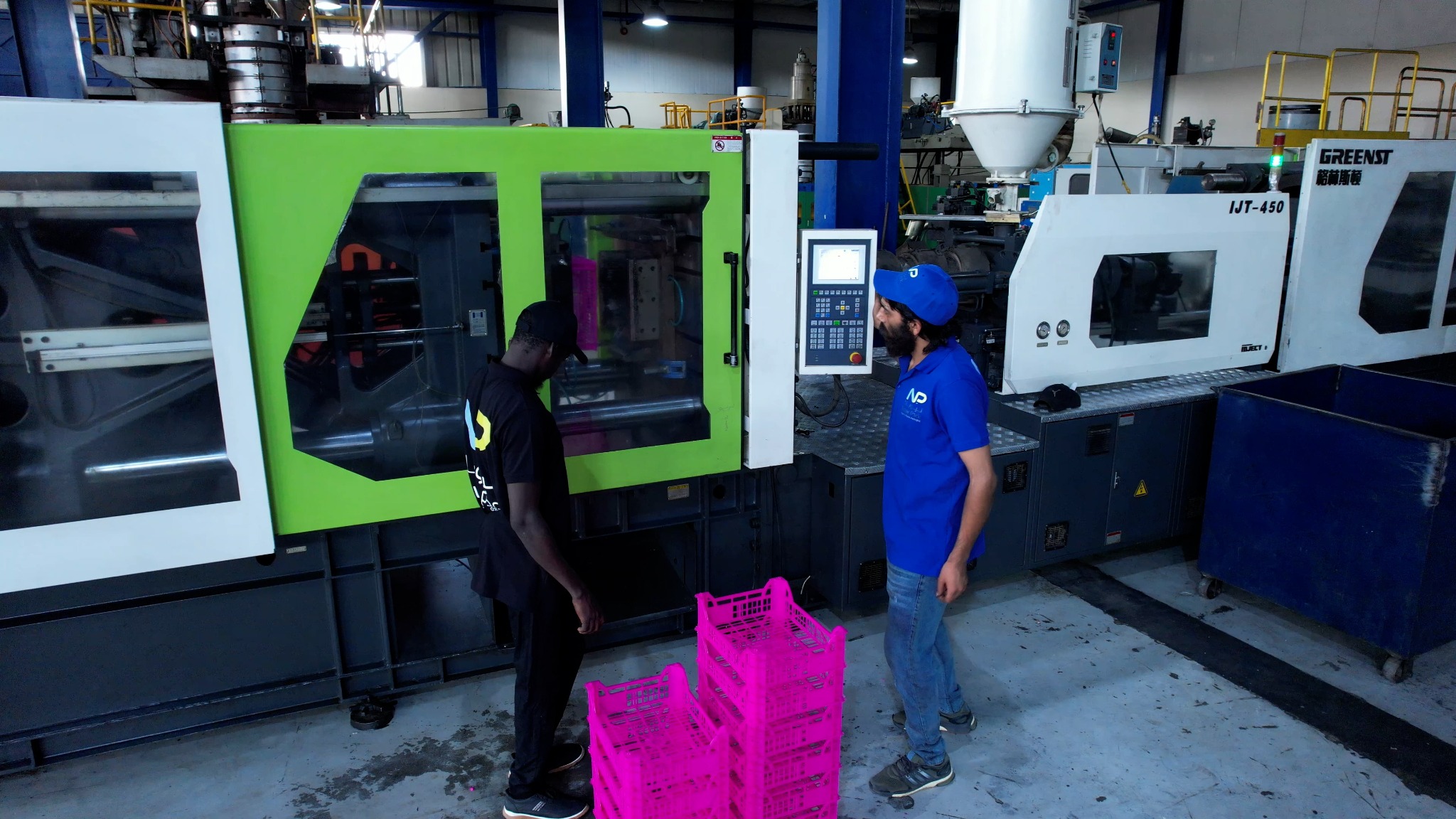 Operators next to production line