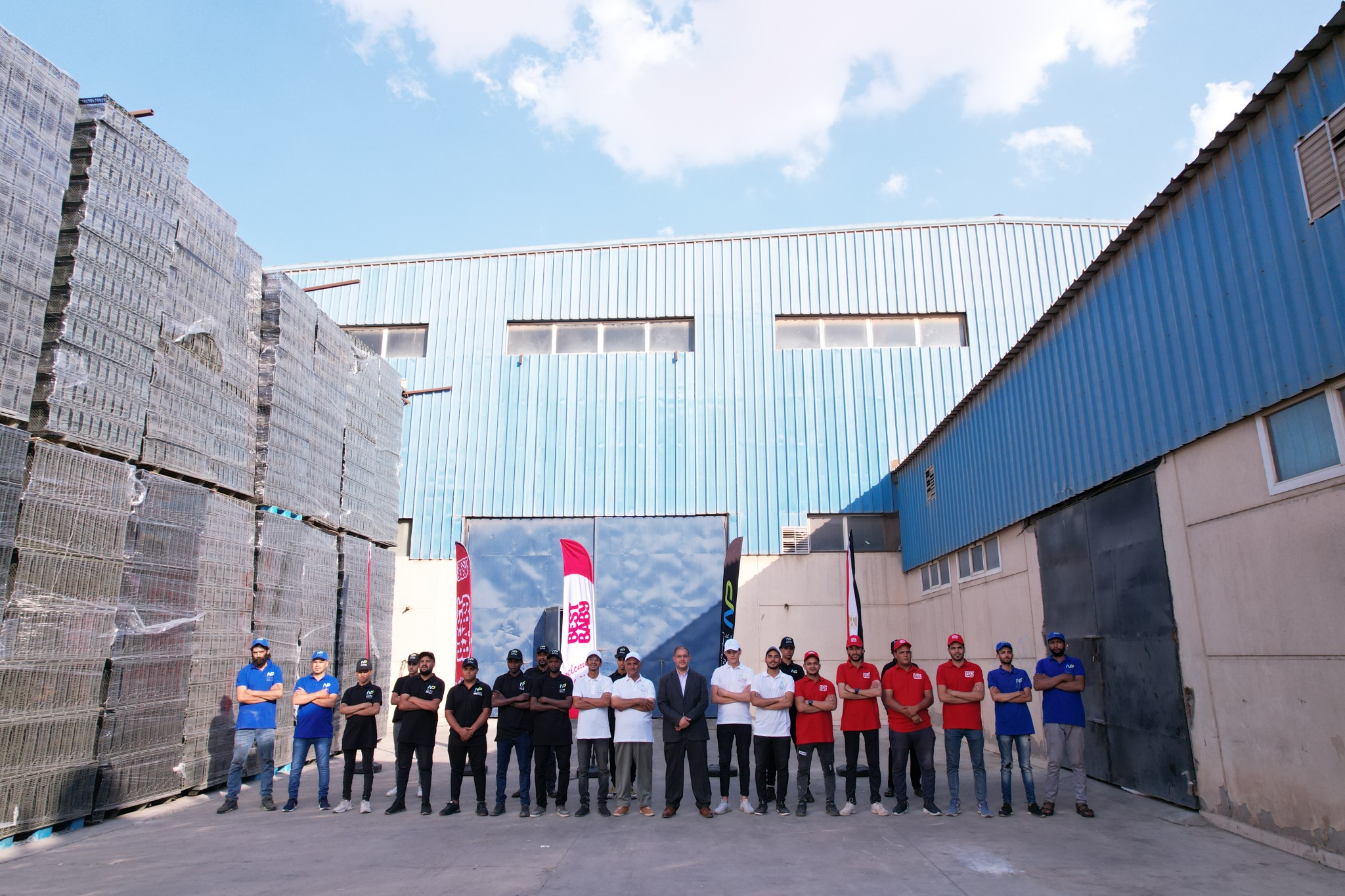 New Pack team in factory yard